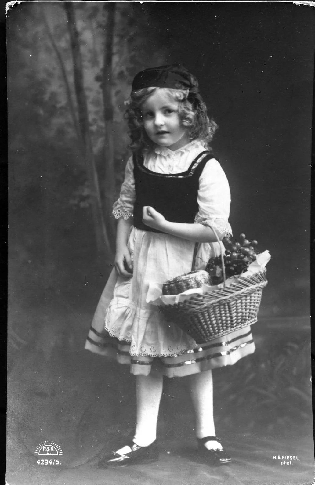 Real Photograph Postcard Little Girl with Hamper Basket of Food