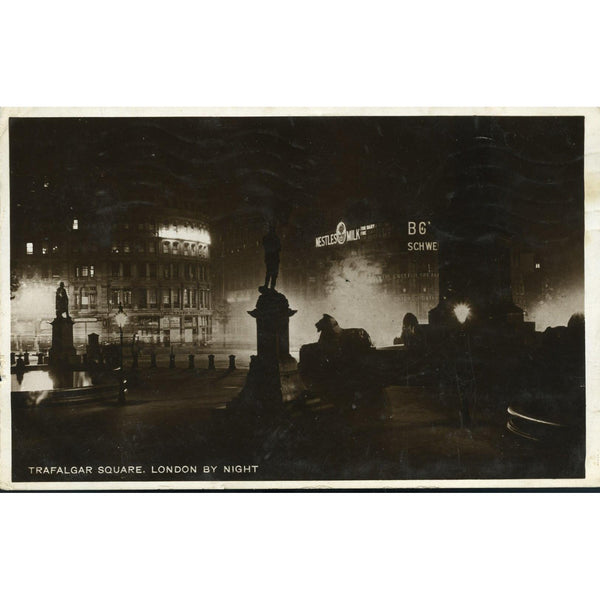 Real Photograph Postcard  'Trafalgar Square. London by Night'